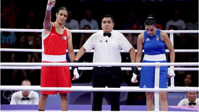 Imane Khelif (L) of Algeria is declared winner aber Angela Carini of Italy abandoned their bout in the Women 66kg preliminaries round of 16 against Imane Khelif of the Boxing competitions in the Paris 2024 Olympic Games, at the North Paris Arena in Villepinte, France, 01 August 2024.